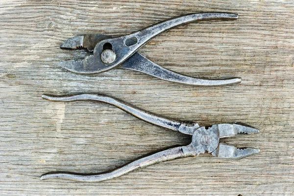 Old Pliers Wooden Background — Stock Photo, Image