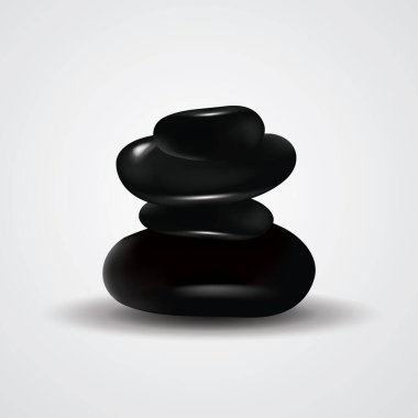 Beyaz üzerine gölge konan siyah spa taşları