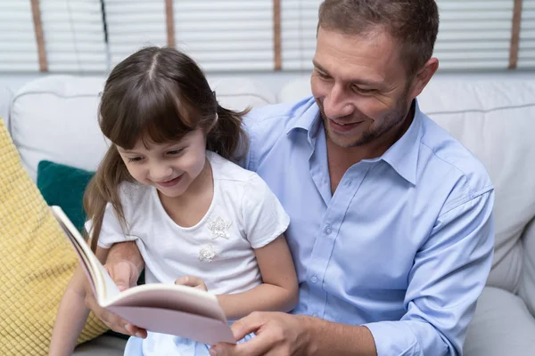 Cute Little Girl Her Handsome Father Reading Book Smiling Together — Stock Photo, Image