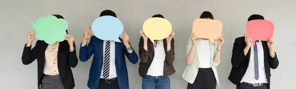 Panoramic banner image of Business Team Holding Speech Bubble ic