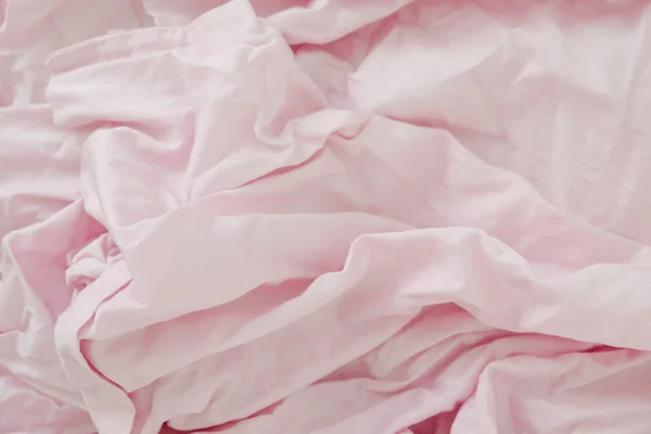 Crumpled Pastel Pink Bed Linen Light Background — Stock Photo, Image