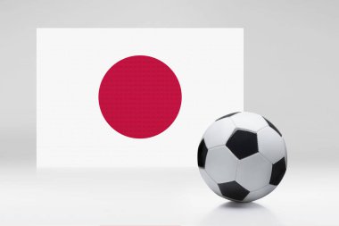 Futbol topuyla Japonya bayrağı