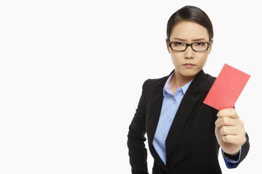 Angry businesswoman holding up  a red card clipart
