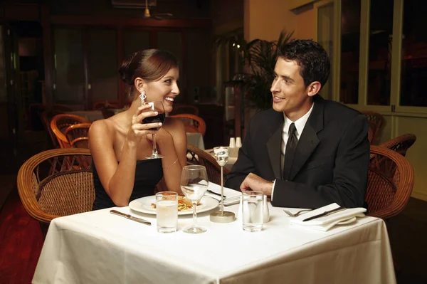 A couple having dinner in a restaurant