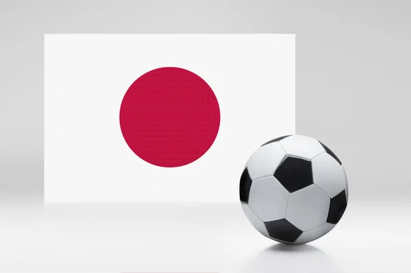 サッカーボールで日本の旗 — ストック写真