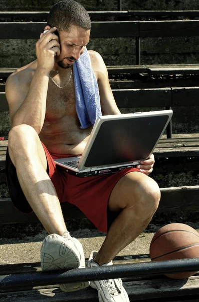 Man Sitting Stairs Talking Hand Phone While Using His Laptop — Stock Photo, Image