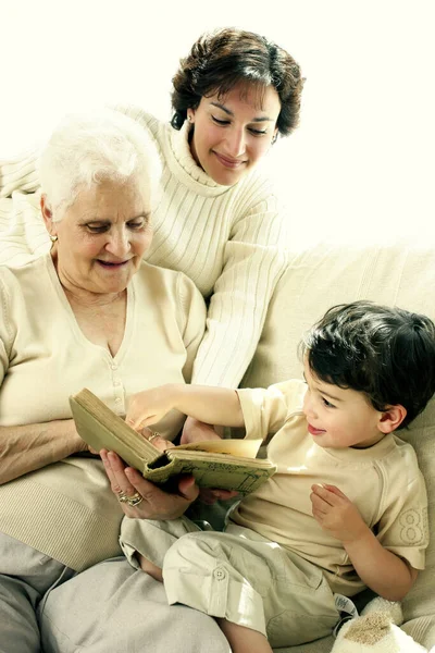 Young Boy Having Fun Learning His Grandmother Mother — Stockfoto