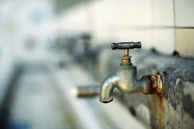 close up view of old metal tap