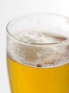fresh lager with foam, close up view