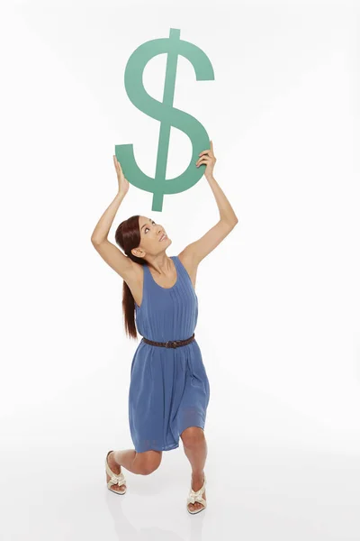 Vrouw Tilt Een Dollarteken — Stockfoto