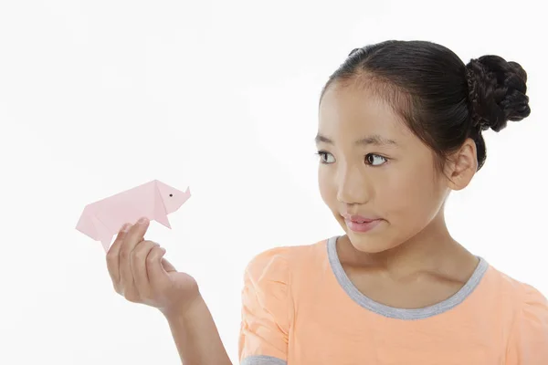 Girl Playing Miniature Paper Pig — Stock Photo, Image