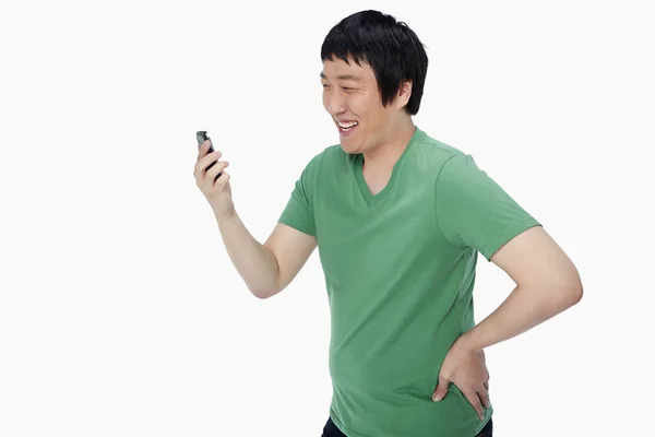 Cheerful Man Text Messaging His Mobile Phone — Stock Photo, Image