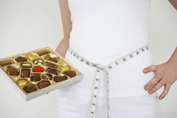 Woman Tape Measure Her Waist Holding Box Chocolates — Stock Photo, Image