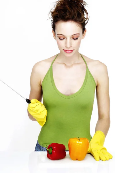 Woman Preparing Cut Capsicums — Stock Fotó
