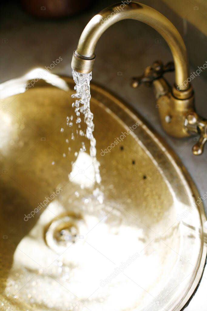 close up of  Running water in sink 