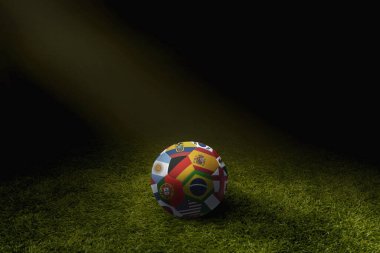 Dünya futbol topunu oyun sahasında bayraklar