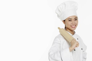 Kadın aşçı elinde merdaneyle