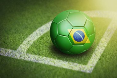 Brezilya bayraklı futbol topuyla köşeyi dönüyor