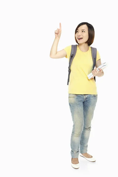 Mujer Alegre Señalando Derecha —  Fotos de Stock