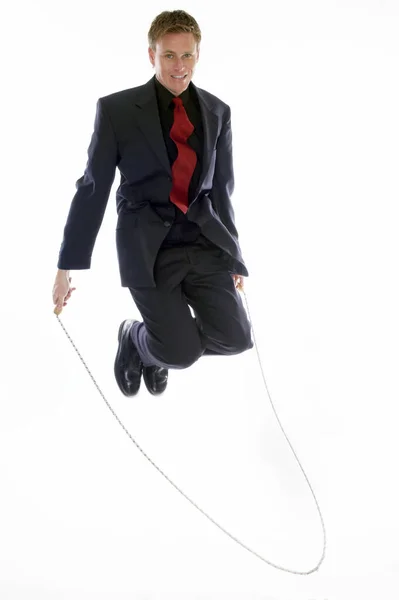 Homem Traje Negócios Jogando Com Corda Salto — Fotografia de Stock