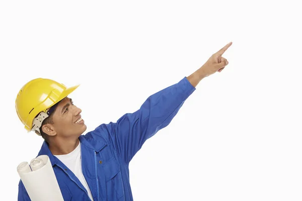 Stavební Dělník Ukazuje Doleva — Stock fotografie