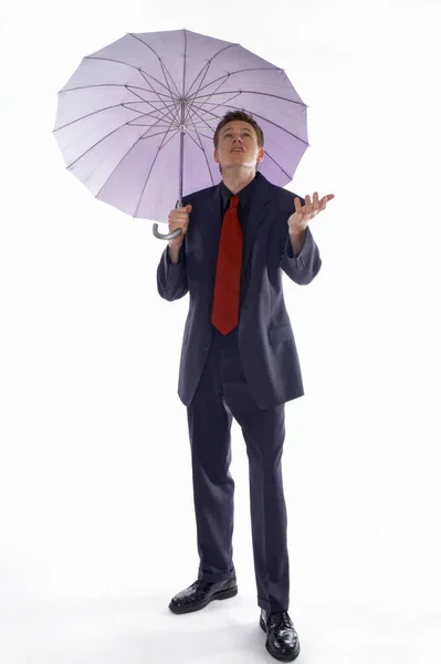 Hombre Traje Negocios Sosteniendo Paraguas Mientras Comprueba Clima —  Fotos de Stock