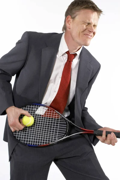 Affärsman Som Håller Tennisracket Och Boll Som Att Spela Gitarr — Stockfoto