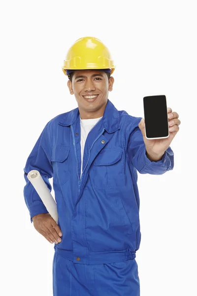 Bauarbeiter Hält Ein Handy Die Höhe — Stockfoto