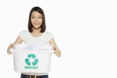 Woman holding up a container of shredded paper clipart