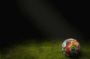 Dünya futbol topunu oyun sahasında bayraklar
