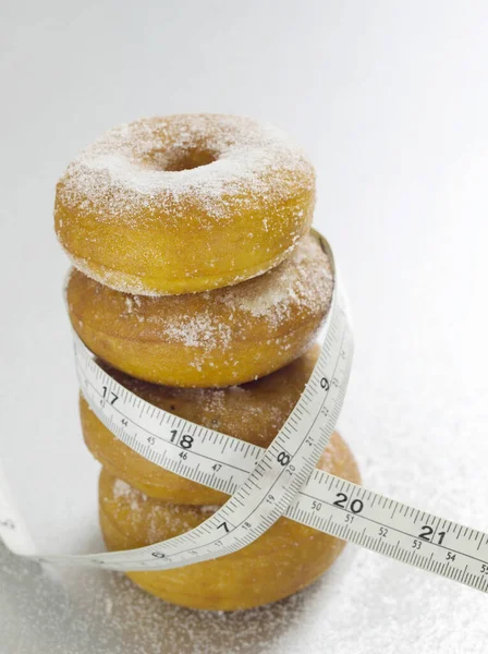 关闭甜甜圈和卷尺测量 — 图库照片