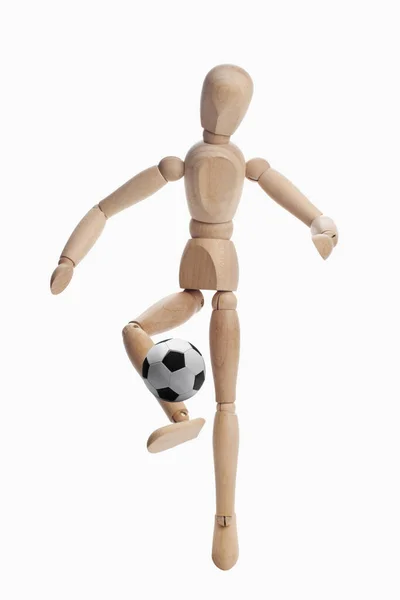 Wooden Dummy Model Playing Soccer — Stock Photo, Image
