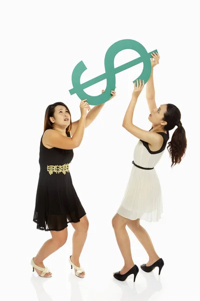 Vrouwen Tillen Een Dollarteken — Stockfoto