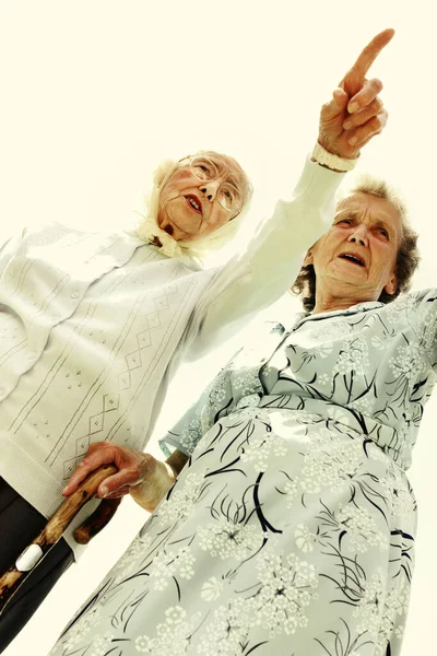 Low Angle View Old Woman Showing Something Her Friend Who — Stockfoto