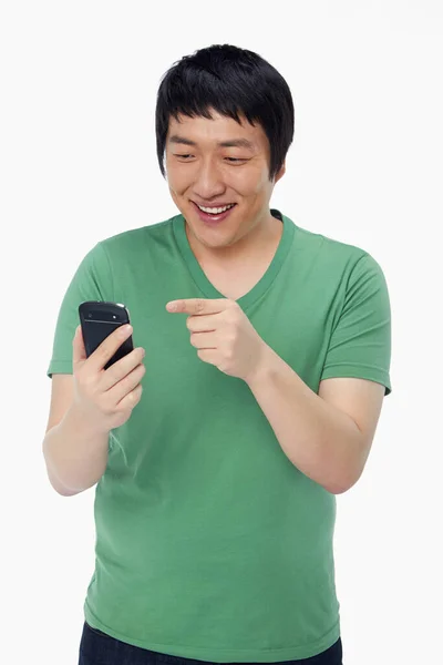 Cheerful Man Text Messaging His Mobile Phone — Stock Photo, Image