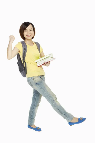 Mujer Con Mochila Libro Mostrando Gesto Mano —  Fotos de Stock