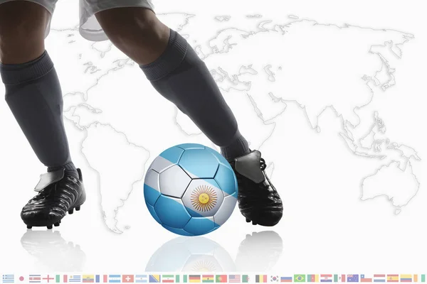 Soccer player dribble a soccer ball with Argentina flag