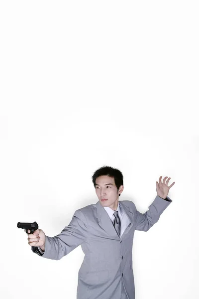 Businessman Aiming His Pistol — Stock Photo, Image