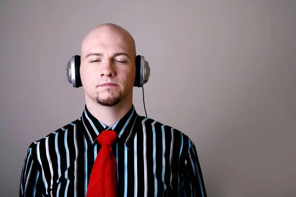 Businessman Closing His Eyes While Listening Music Headphones — Stock Photo, Image