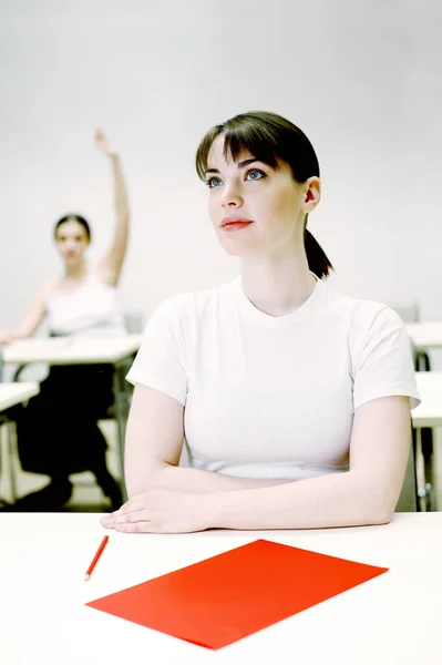 Woman paying attention in class