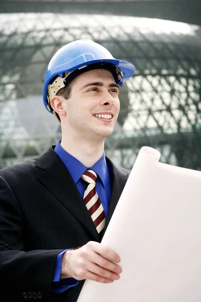 Ingeniero Con Casco Seguridad Sosteniendo Plan —  Fotos de Stock