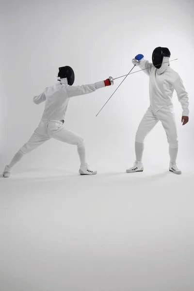 Two Men Fencing Suits Dueling — Stock Photo, Image