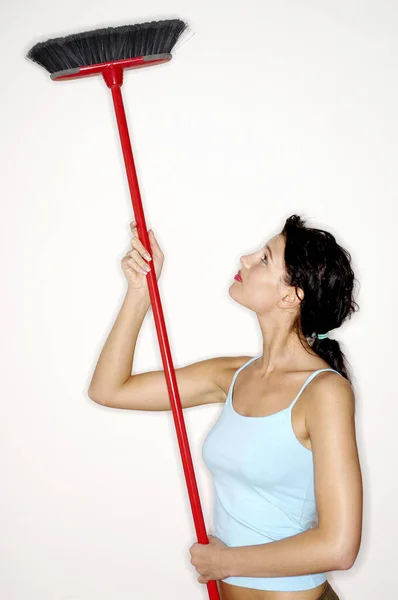 Woman Cleaning Ceiling Broom — Stock Photo, Image