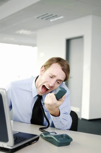 Businessman Screaming Phone Receiver — Stockfoto