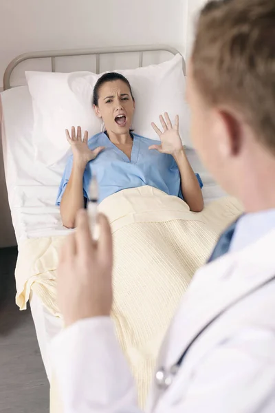 Doctor Holding Syringe Patient Screaming — Stock Photo, Image