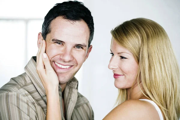 Lady Touching Man Face Stock Picture