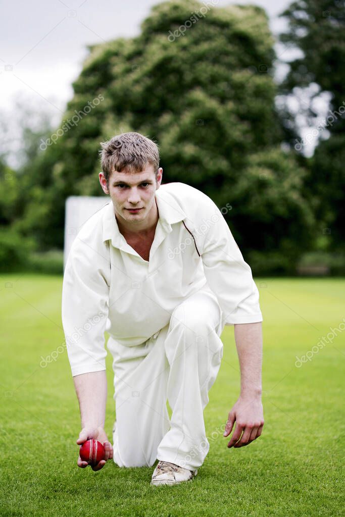 Man preparing to throw a cricket ball