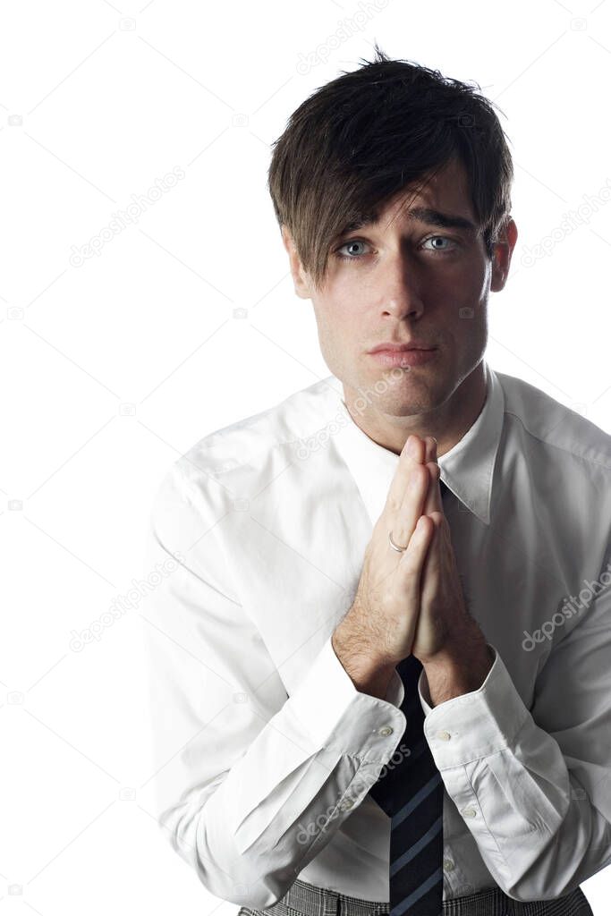Businessman begging on white background