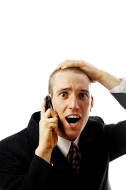 İş adamı cep telefonuyla konuşuyor.