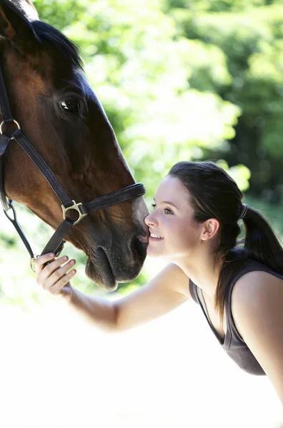 Woman Playing Her Horse — Stock Photo, Image